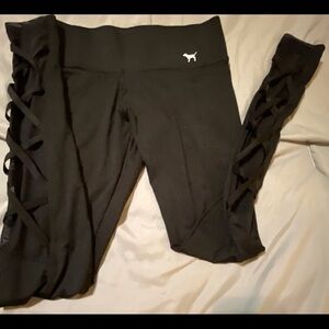 Victoria’s Secret Pink yoga pants in black with criss cross mesh. Size XS/XP
